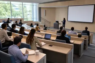 modern classroom amphitheater with students in a training session, neutral professional atmosphere, no visible faces